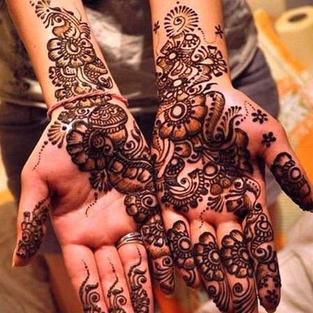 covered with mehendi designs 