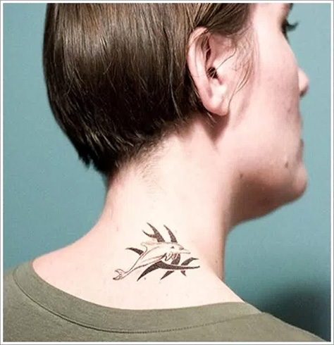 Dolphin tattoo on neck