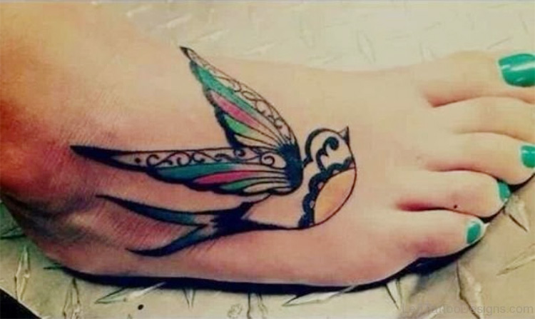 Cool bird tattoo on foot