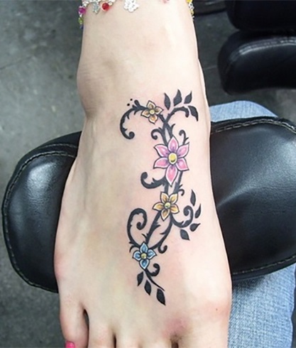 Floral footprint tattoo for girls
