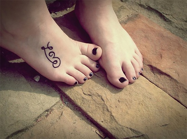Love tattoo on foot