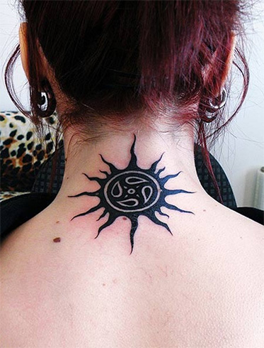 Sun tattoo on neck