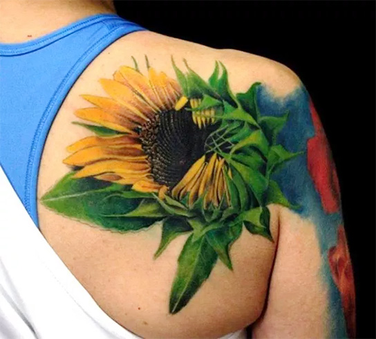 Sunflower tattoo on shoulder