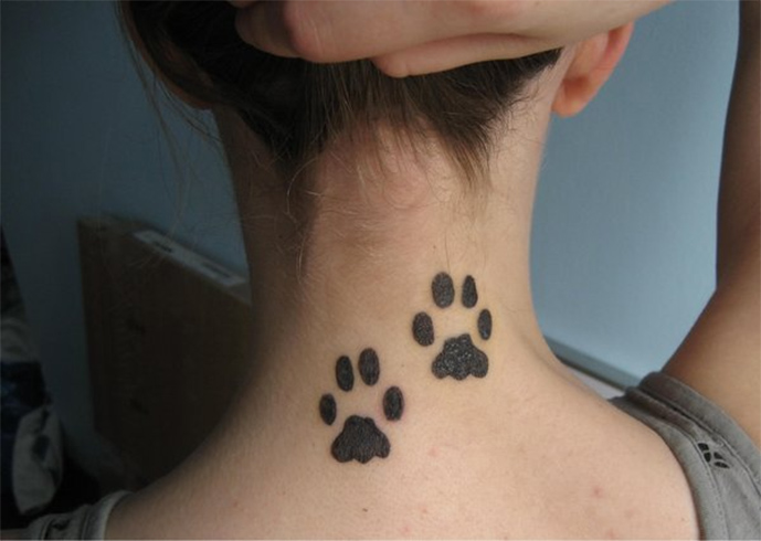 Paw tattoo on neck