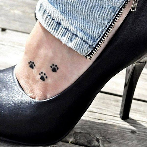 Paw print tattoo for girls