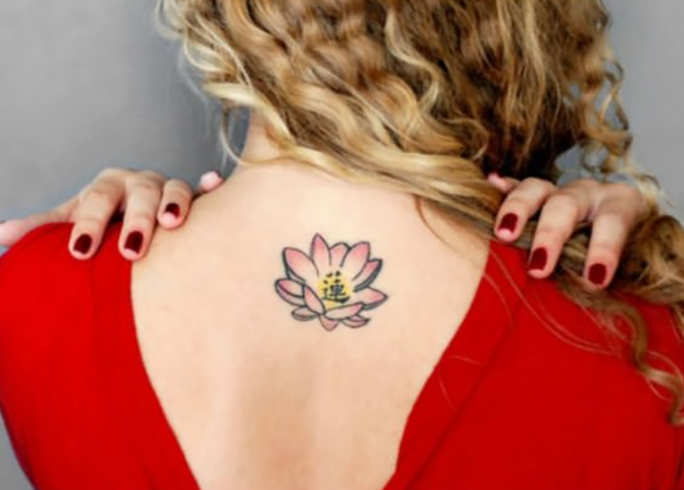 Lotus tattoo on back shoulder