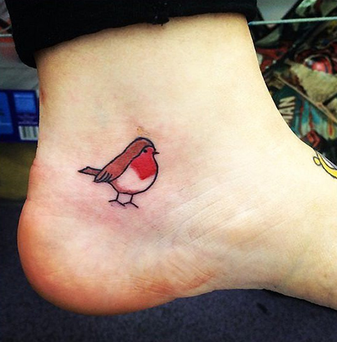 Cute robinhood tattoo for girls