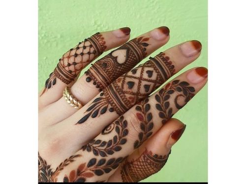 the one with endearing hands finger mehndi design