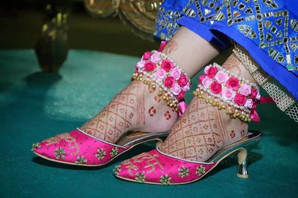 pink-hued set of floral anklets